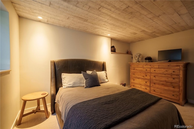 carpeted bedroom featuring baseboards, wooden ceiling, and recessed lighting