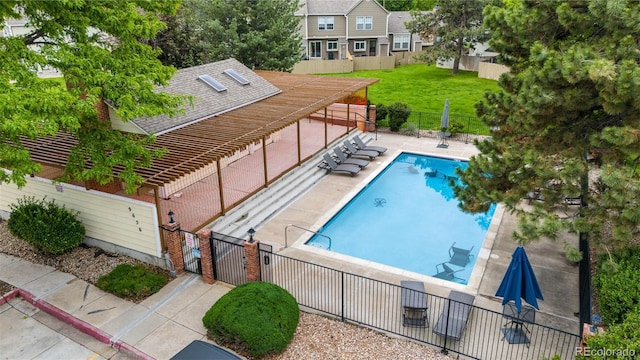 9632 W Chatfield Ave Unit C, Littleton, CO 80128 - community pool with a patio area and a gate