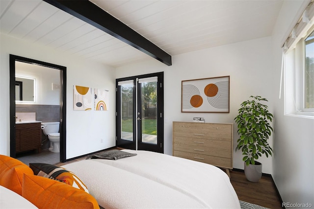 bedroom featuring connected bathroom, multiple windows, dark wood-type flooring, and access to exterior