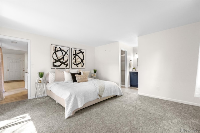 9587 W 89th Cir, Broomfield, CO 80021 - bedroom featuring light colored carpet and connected bathroom