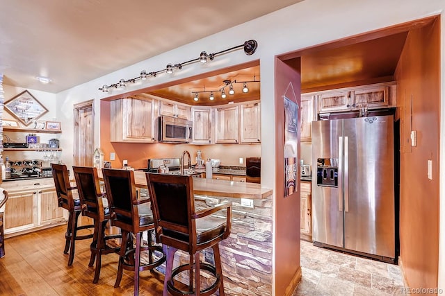 1937 Soda Ridge Rd Unit 1132, Dillon, CO 80435 - kitchen featuring stainless steel appliances and a peninsula