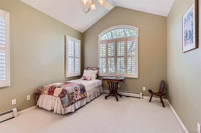 carpeted bedroom with a baseboard heating unit, lofted ceiling, baseboards, and ceiling fan