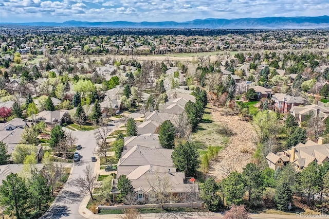 aerial view of residential area with a mountain backdrop