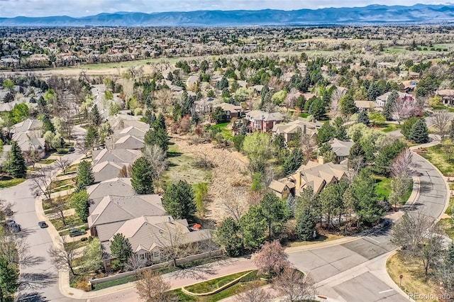 aerial perspective of suburban area with mountains