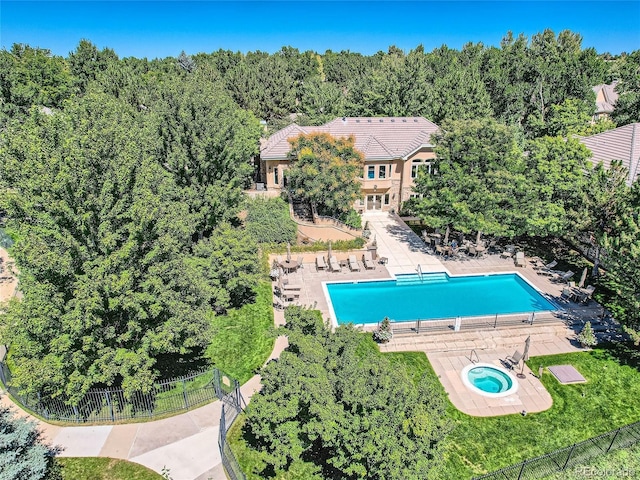 view of subject property featuring a pool