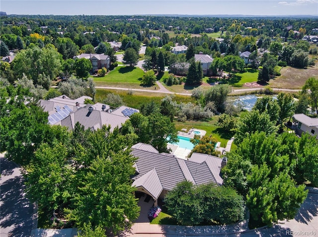 aerial view of residential area with a pool area