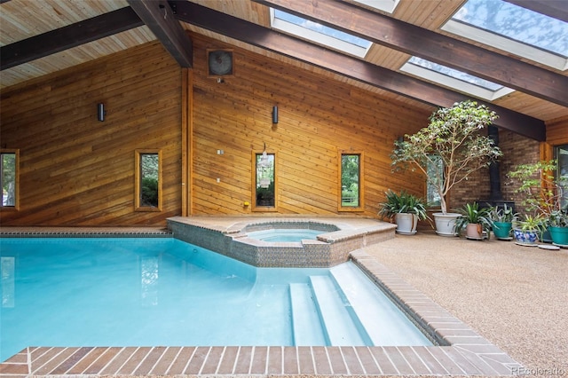 7351 Poppy Way, Arvada, CO 80007 - view of swimming pool featuring a pool with connected hot tub and a patio area