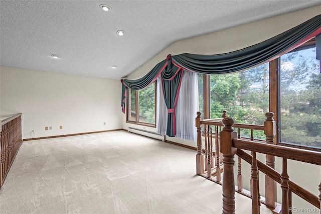7351 Poppy Way, Arvada, CO 80007 - unfurnished room featuring light carpet, a textured ceiling, recessed lighting, and an upstairs landing
