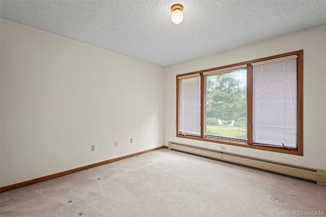7351 Poppy Way, Arvada, CO 80007 - unfurnished room featuring a baseboard radiator, light carpet, and a textured ceiling