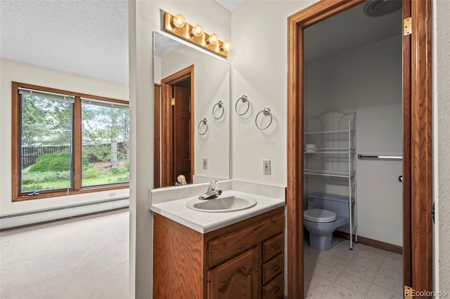 7351 Poppy Way, Arvada, CO 80007 - bathroom featuring vanity, a baseboard radiator, and tile patterned floors