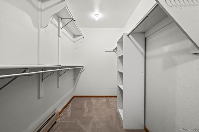 7351 Poppy Way, Arvada, CO 80007 - walk in closet featuring carpet flooring and baseboard heating