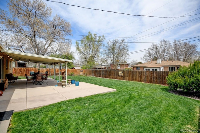 view of yard featuring a patio and a fenced backyard