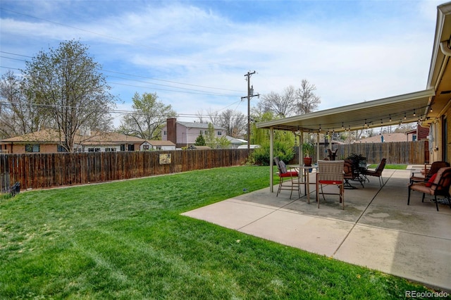 view of yard with a fenced backyard and a patio area