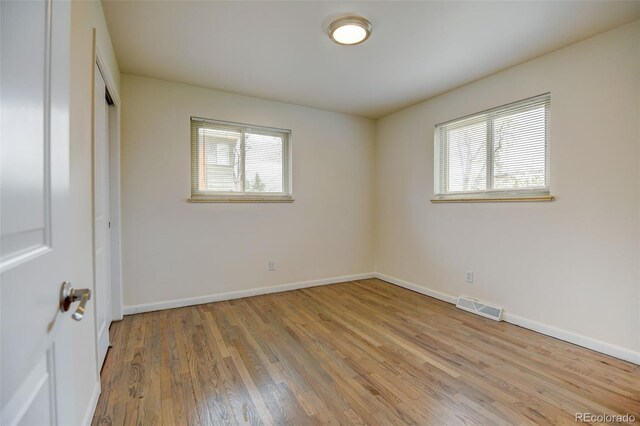 6020 Quail St, Arvada, CO 80004 - unfurnished bedroom featuring wood finished floors and a closet