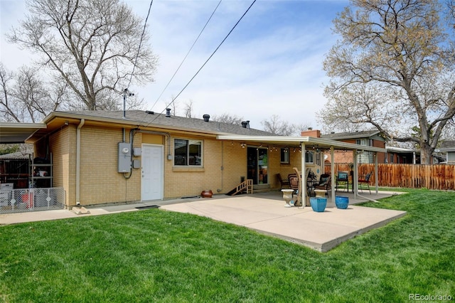 6020 Quail St, Arvada, CO 80004 - rear view of property featuring brick siding, a patio, a chimney, and entry steps