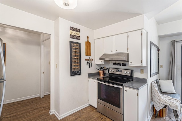 7250 Eastmoor Dr Unit 203, Denver, CO 80237 - kitchen with stainless steel electric range oven, under cabinet range hood, dark wood-type flooring, white cabinets, and dark countertops