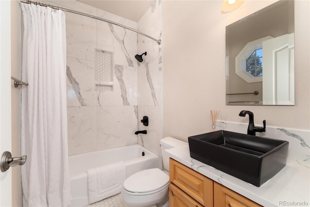 full bathroom with toilet, vanity, and shower / bath combo with shower curtain