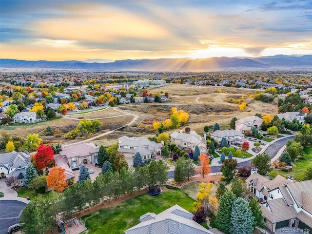 aerial view at dusk with a mountain view