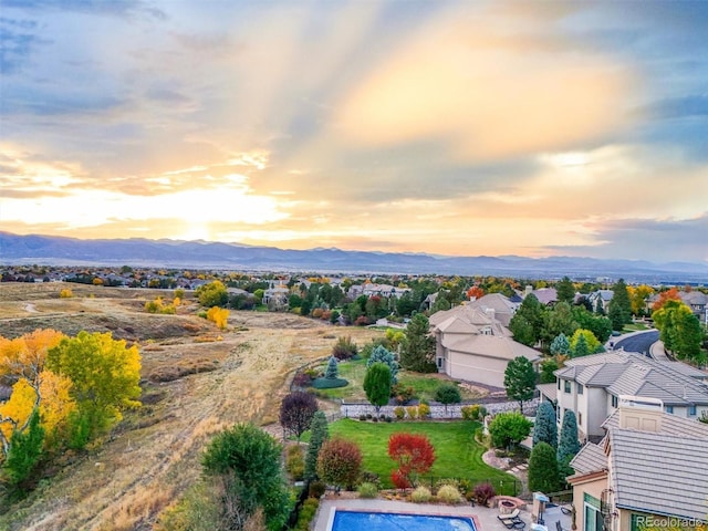 aerial view at dusk with a mountain view