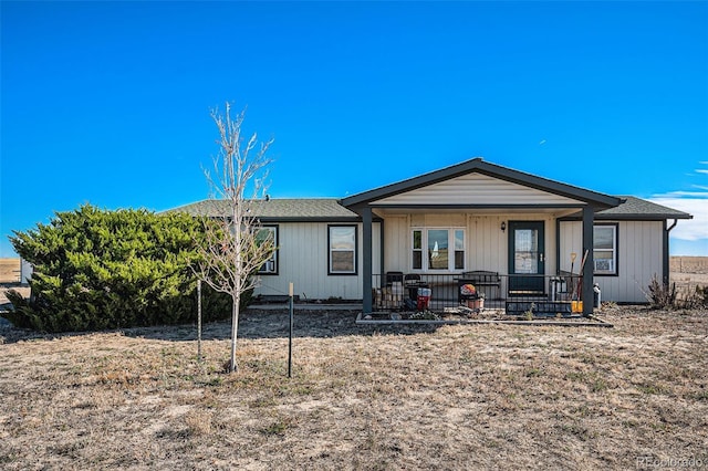 view of front of home featuring covered porch