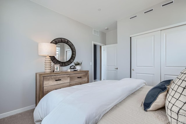 bedroom featuring carpet floors and a closet