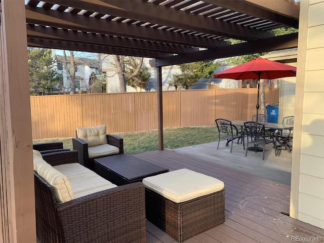 wooden deck featuring outdoor dining area, fence, and a pergola