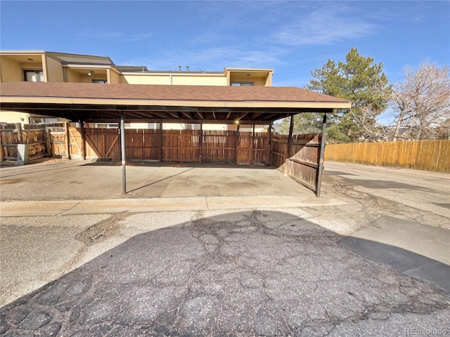 view of car parking with a carport