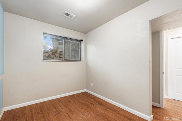 309 S 30th Ave, Brighton, CO 80601 - unfurnished room with wood finished floors and baseboards