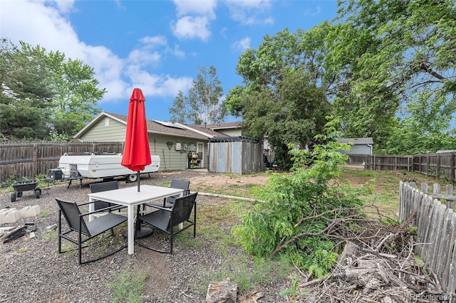 309 S 30th Ave, Brighton, CO 80601 - fenced backyard featuring outdoor dining space