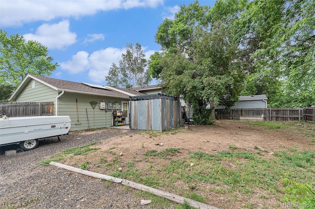 309 S 30th Ave, Brighton, CO 80601 - fenced backyard with a storage unit
