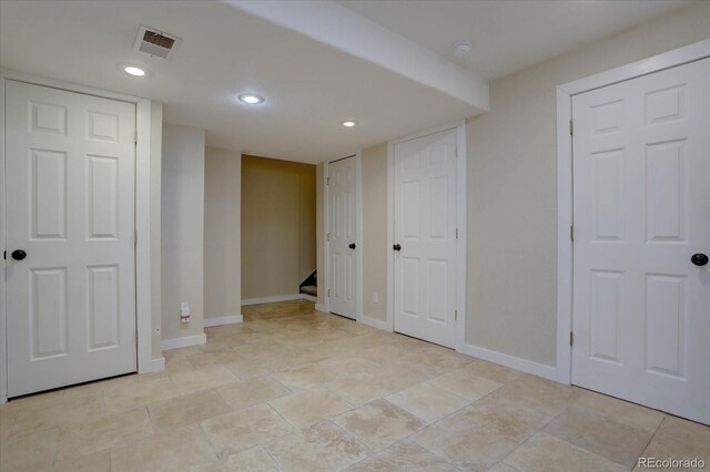 interior space featuring multiple closets