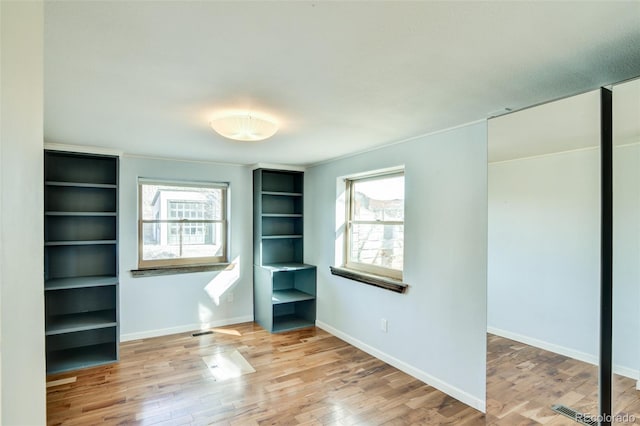 unfurnished bedroom featuring light hardwood / wood-style flooring