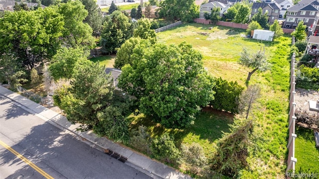 1245 S Willow St, Denver, CO 80247 - aerial perspective of suburban area featuring a tree filled landscape