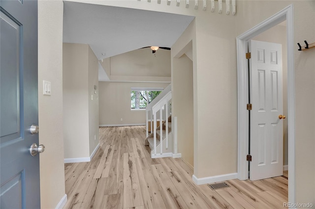 2140 W 135th Ave, Westminster, CO 80234 - entryway with wood finished floors, stairway, and baseboards