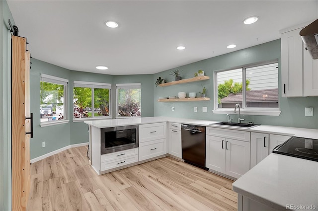 2140 W 135th Ave, Westminster, CO 80234 - kitchen with dishwasher, a sink, plenty of natural light, stainless steel microwave, and recessed lighting