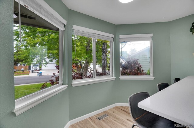 2140 W 135th Ave, Westminster, CO 80234 - home office featuring wood finished floors, plenty of natural light, and baseboards