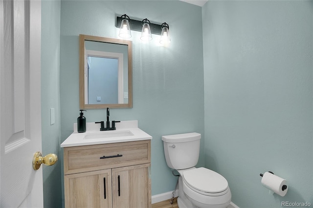 2140 W 135th Ave, Westminster, CO 80234 - bathroom with vanity, toilet, and baseboards