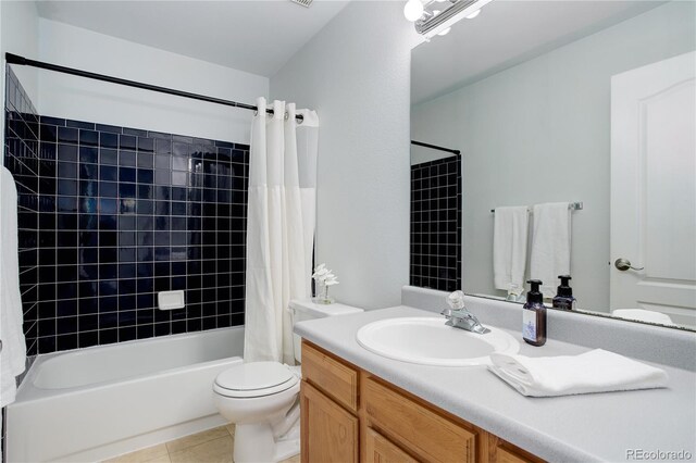 bathroom featuring tile patterned flooring, shower / bath combination with curtain, toilet, and vanity