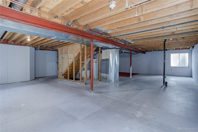 basement featuring stairway