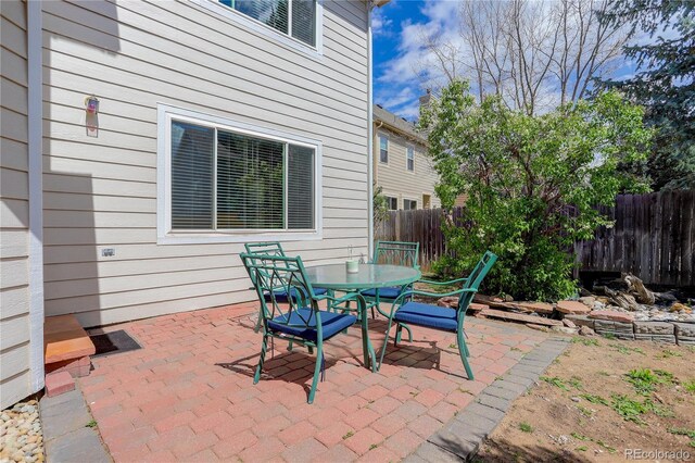 view of patio / terrace with fence and outdoor dining space