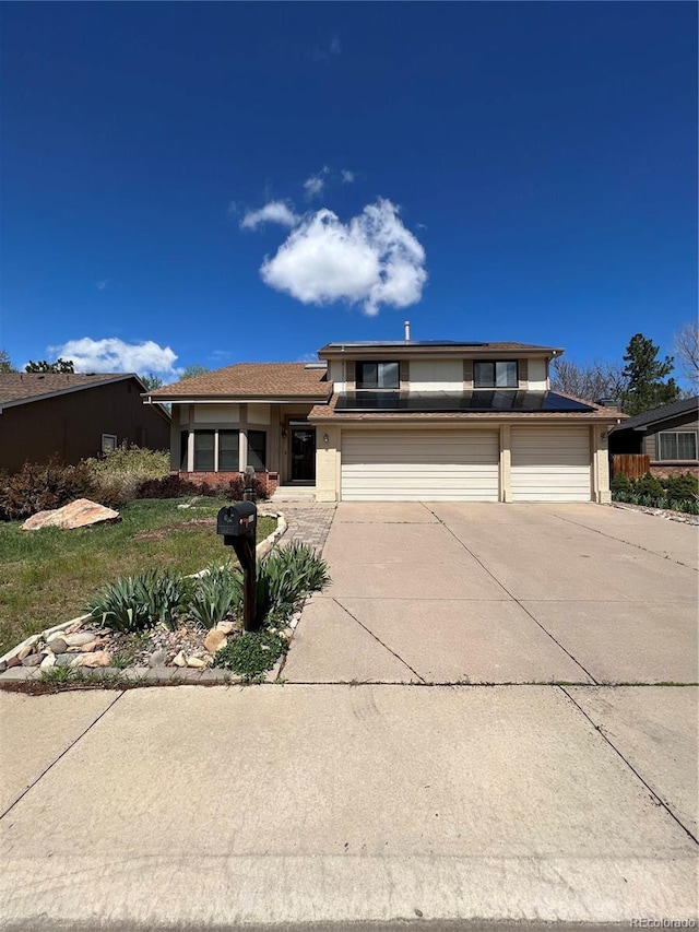 15983 E Loyola Dr, Aurora, CO 80013 - view of front of property featuring a garage and driveway