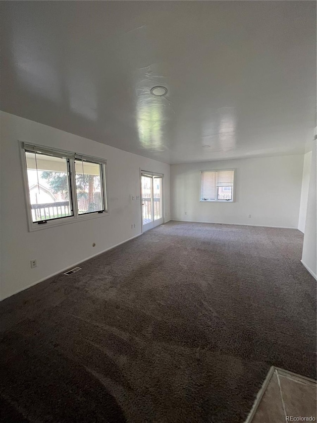 15983 E Loyola Dr, Aurora, CO 80013 - carpeted empty room featuring visible vents