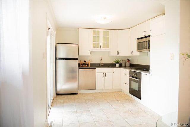 7270 S Cherry Dr, Centennial, CO 80122 - kitchen featuring black appliances, glass insert cabinets, white cabinets, dark countertops, and light tile patterned floors