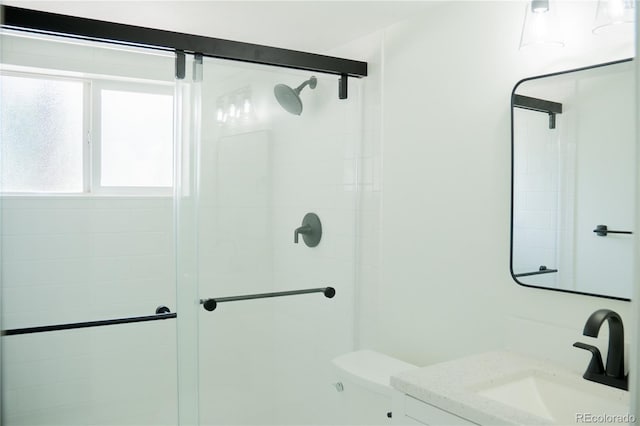 7270 S Cherry Dr, Centennial, CO 80122 - bathroom featuring a shower stall and vanity