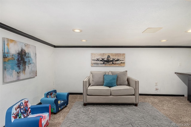 sitting room featuring carpet and ornamental molding