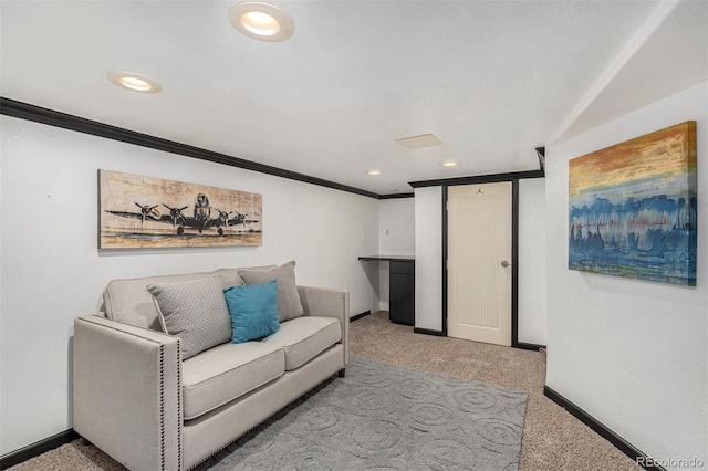 living room featuring light colored carpet and ornamental molding