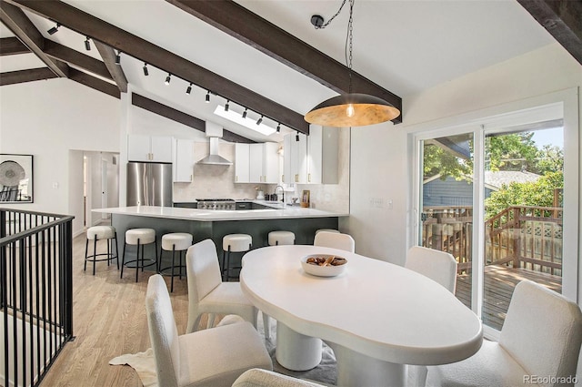 14890 W 58th Pl, Golden, CO 80403 - dining space featuring light wood finished floors