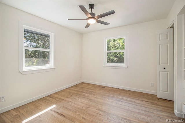 14890 W 58th Pl, Golden, CO 80403 - empty room with light wood-type flooring and ceiling fan