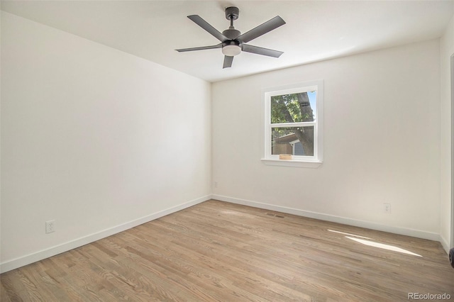 14890 W 58th Pl, Golden, CO 80403 - empty room with light wood-style floors and a ceiling fan