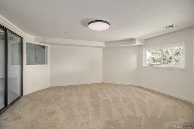 14890 W 58th Pl, Golden, CO 80403 - spare room featuring baseboards and light carpet